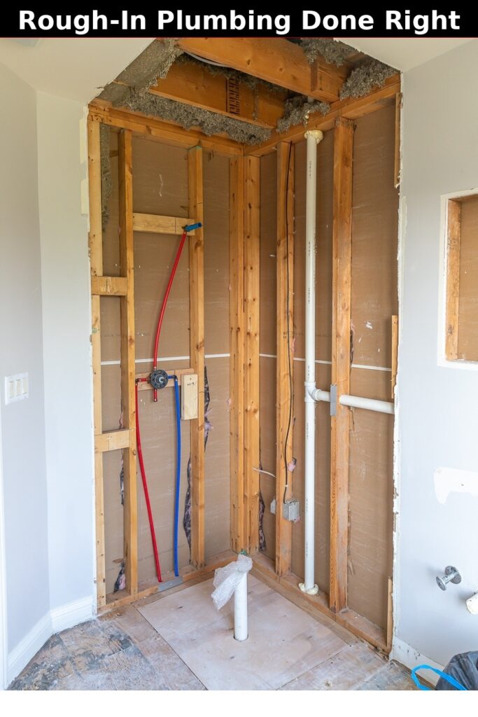 Rough-in plumbing installation with PEX supply lines and shower valve in an exposed stud wall during a bathroom remodel in Lancaster, PA