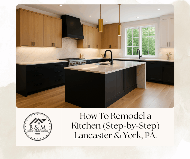 Custom two-tone kitchen with rift-cut white oak uppers, matte black base cabinets, waterfall quartz island, and brass pendants in Lancaster, PA.