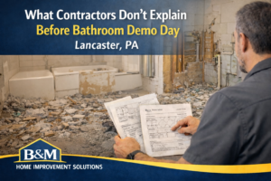 Bathroom demolition in an older Lancaster PA home showing exposed framing and plumbing before remodel planning