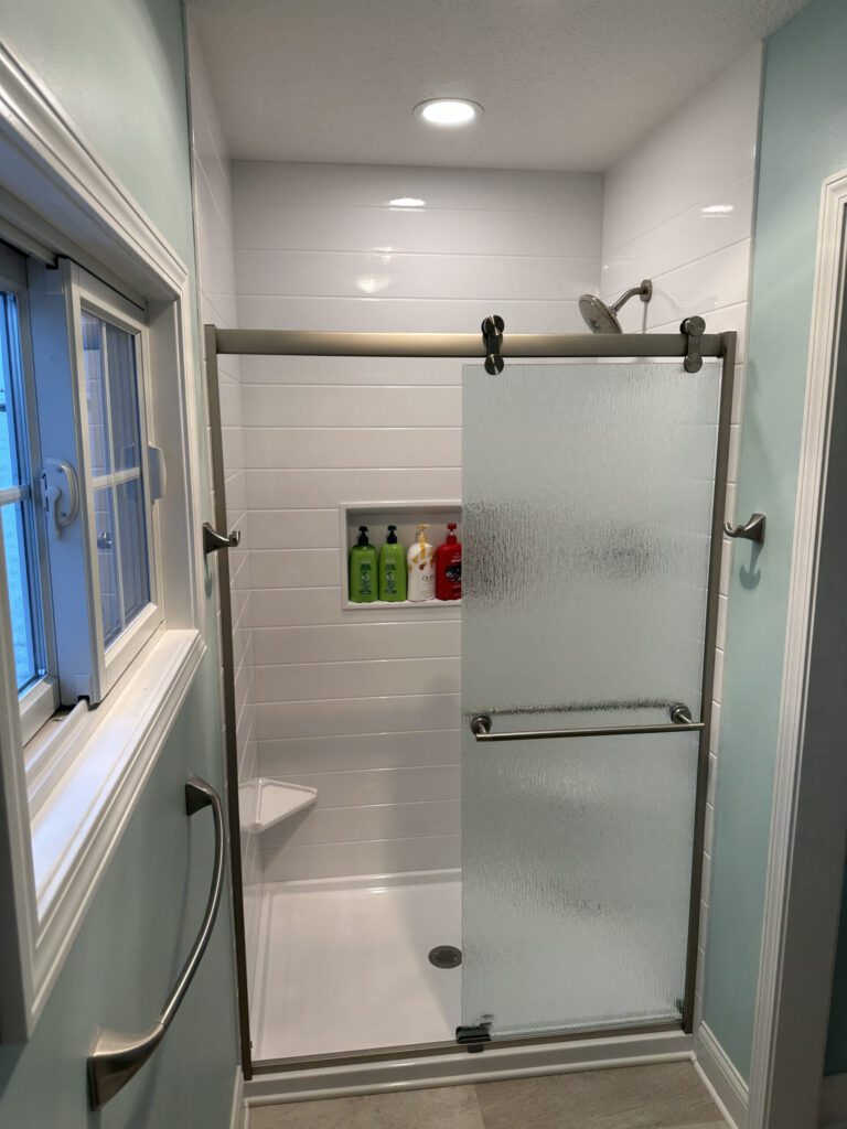 Premium Onyx shower finished wall and glass enclosure